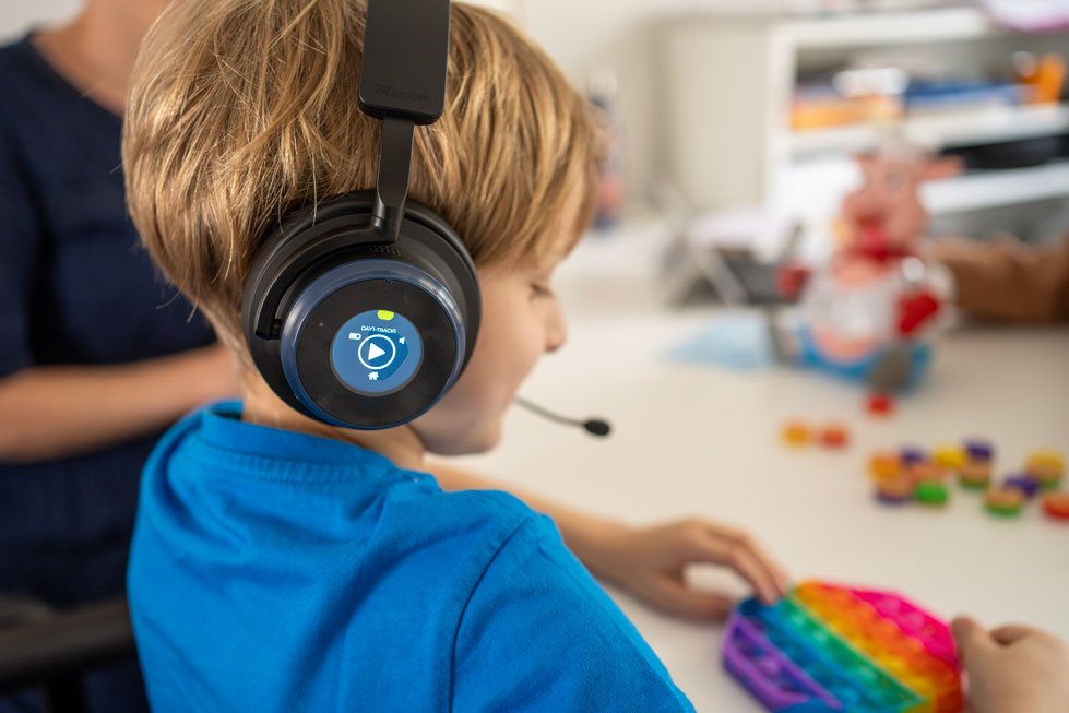 Young child engaged in Tomatis listening session